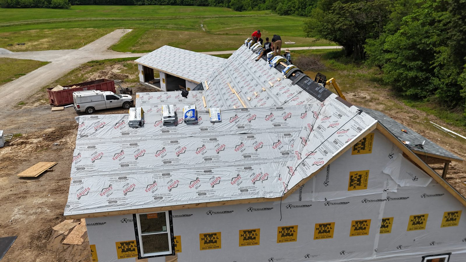 Residential roof installation crew at work